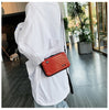 Cluto™ Mini-Koffertasche